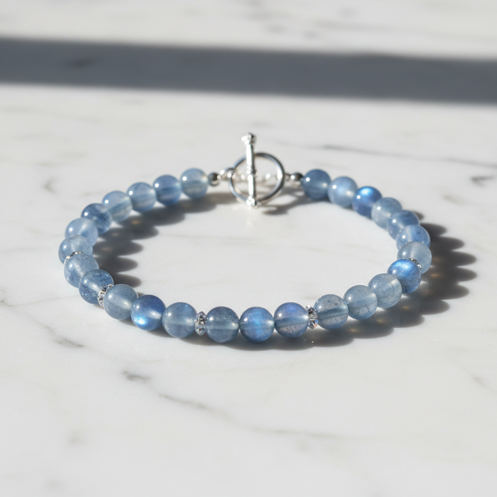 Premium Blue Moonstone Bracelet Strong Blue Flash 7mm on white marble